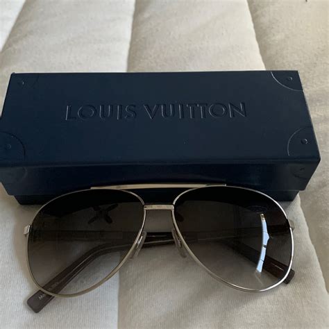 louis vuitton attitude black|louis vuitton aviator sunglasses price.